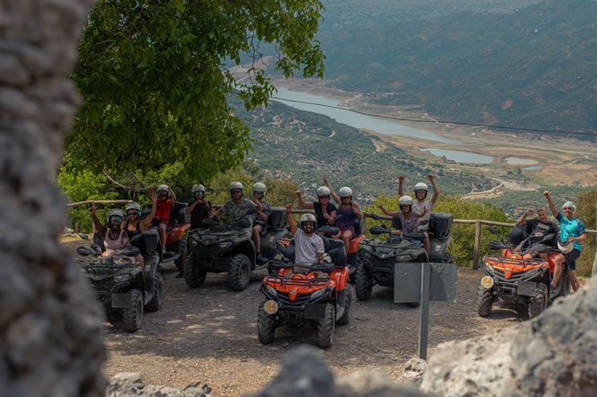 Quad safari exploring dusty mountain paths in Crete
