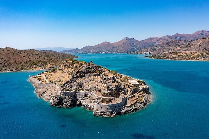 Crystal-clear waters around Spinalonga island during the excursion